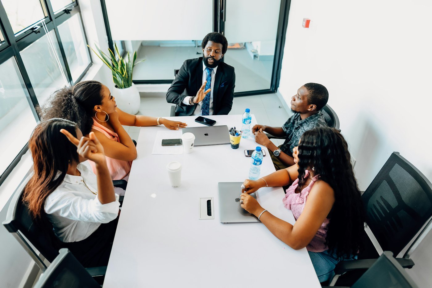 A team of professionals meeting around a table