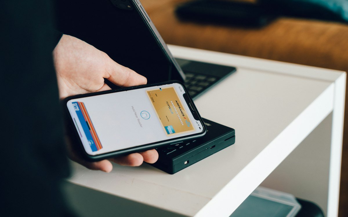 A person paying with a smartphone